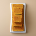 Mysore Pak in white ceramic bowl top view